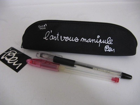 A trousse, or zippered pouch, by French artist Ben for Quo Vadis is a great souvenir gift