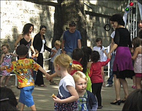 A bal des enfants at a guinguette along a Paris Plage