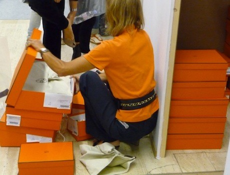 A frenzy for shoes at a Hermès sale.