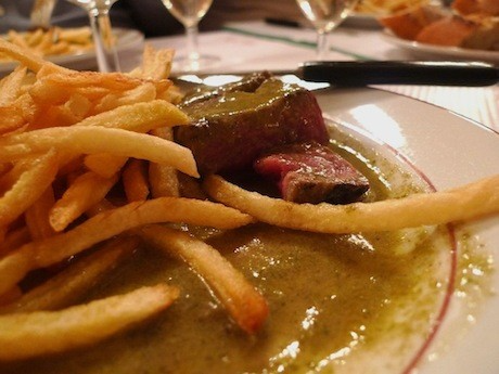 Steak frites at Le Relais de l'Entrecôte, which dishes out delish steak and fries to locals and tripists alike in locations all over Paris