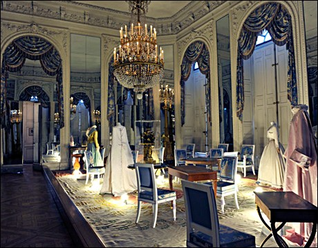 18th-century clothing and Chanel dresses in the Salon des Glaces, at Versailles