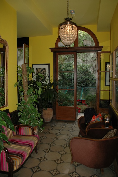 The lobby and tiny terrace at the Hôtel le Relais Saint-Sulpice